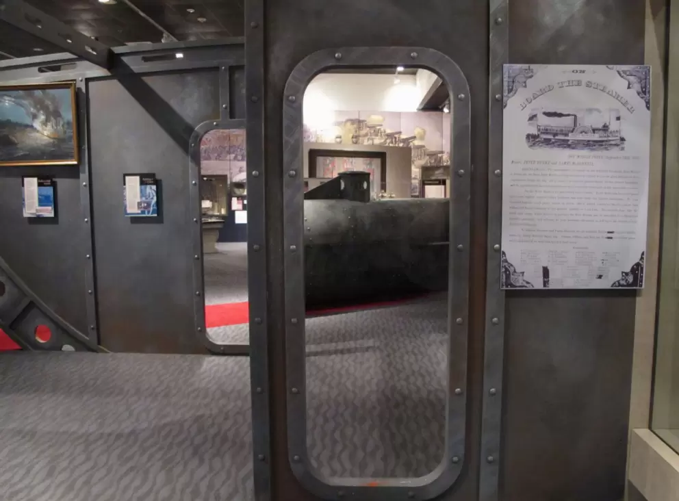Exhibit about women working on military ships in Mobile.