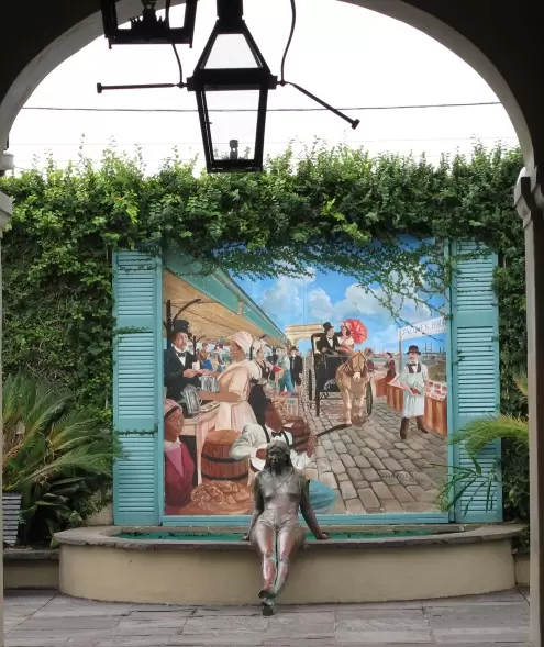 Public art in a side alley along Decatur Street.