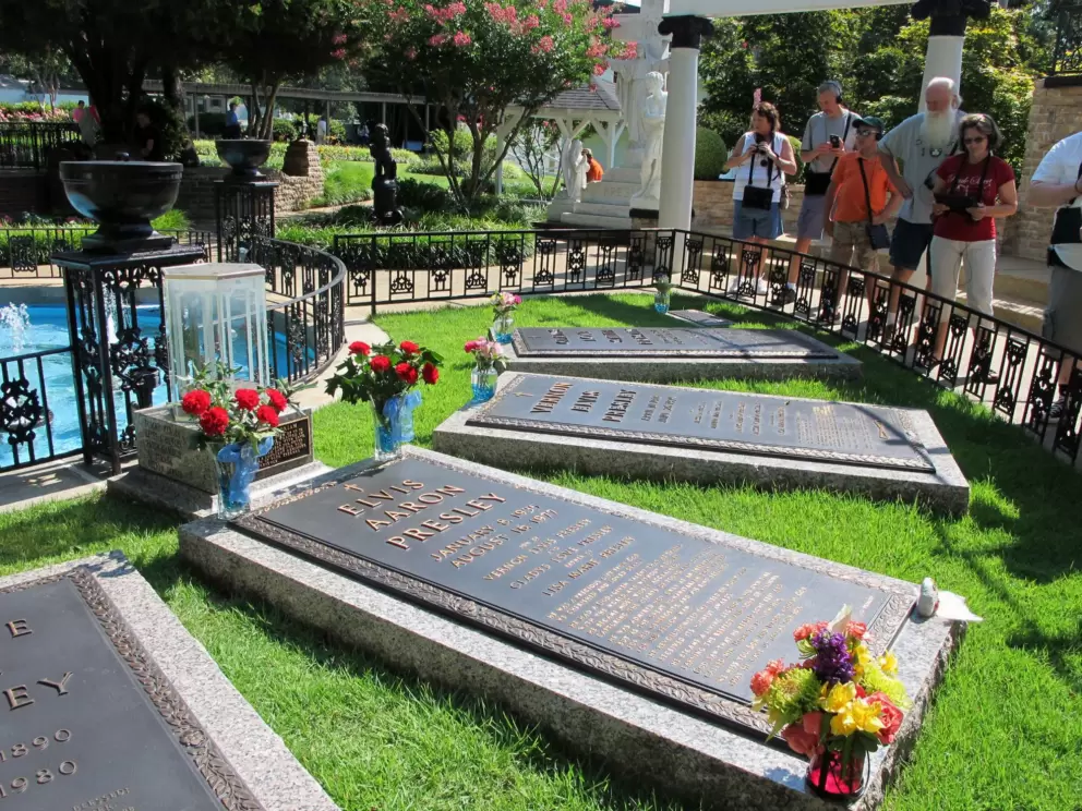 Someone tried to steal Elvis' body so they had to move his grave to the property.