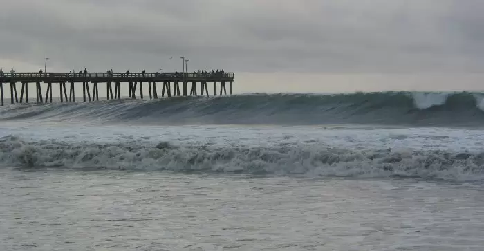 Big wave at the pier.