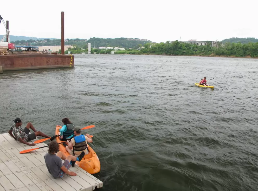 Paddling on the Tennessee River outside the Tennessee Aquarium.