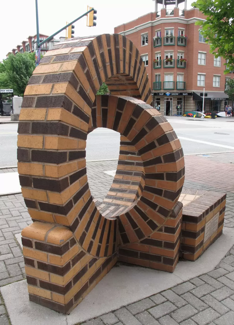Stripey brick sculpture on Market St near the river. Fun for kids to climb inside!