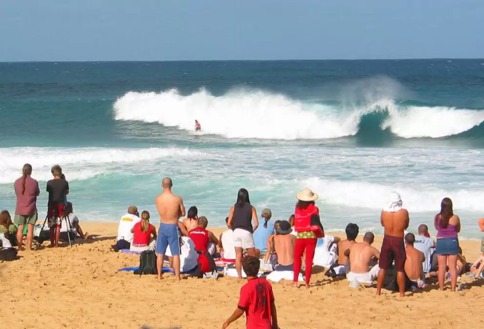 Spectators checking out the surf contest at Pipeline. A fun place to hang out and people watch in between waves.