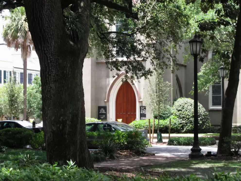 Tree, church door, and lamppost.