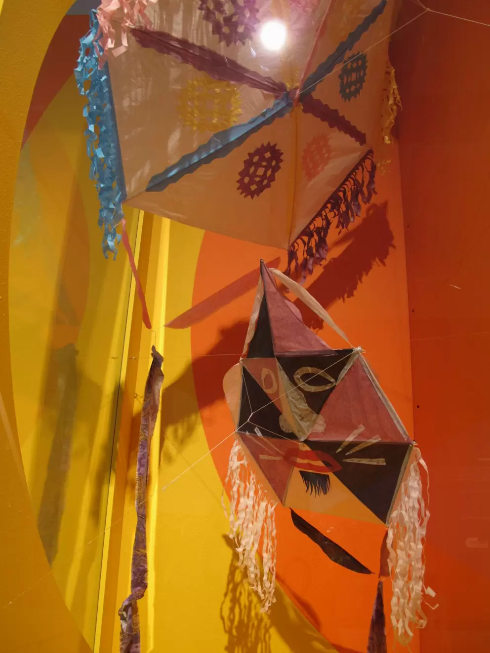 Haitian kites with fringed edges that make a pleasing sound in the wind.