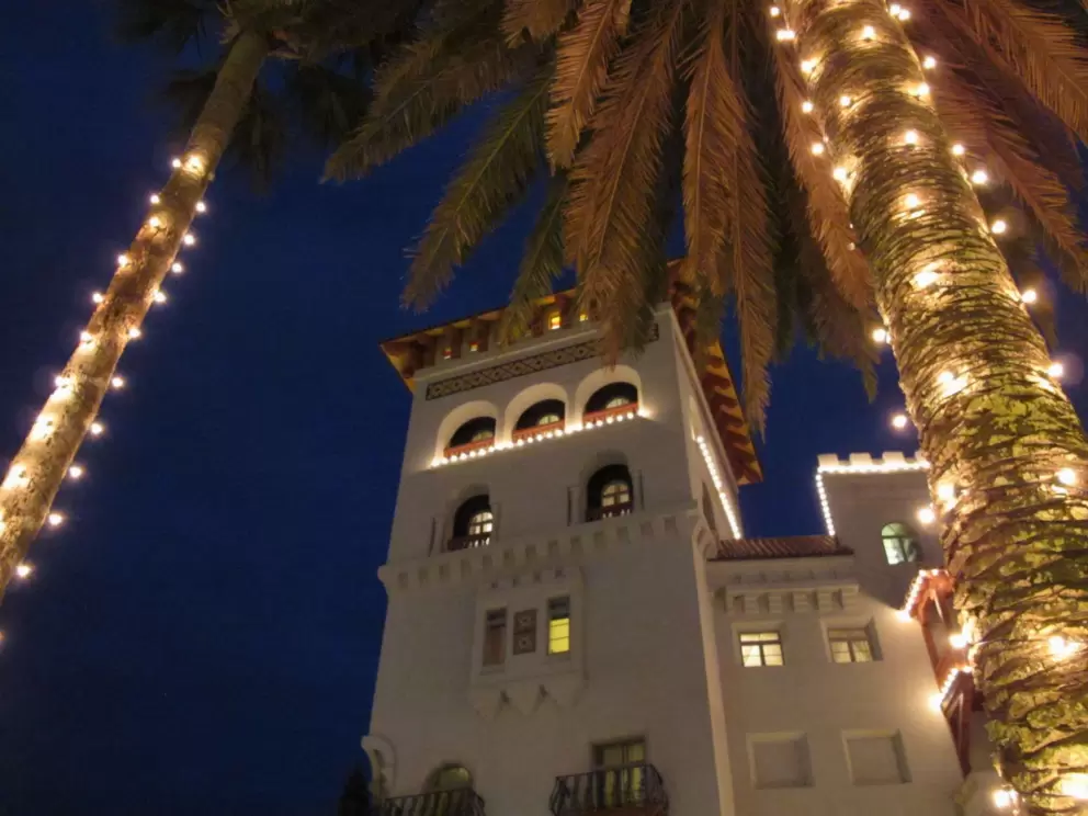Casa Monica and palm trees, at Christmas time.