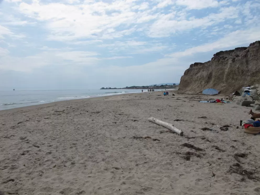 The cliffs that provide some shade.