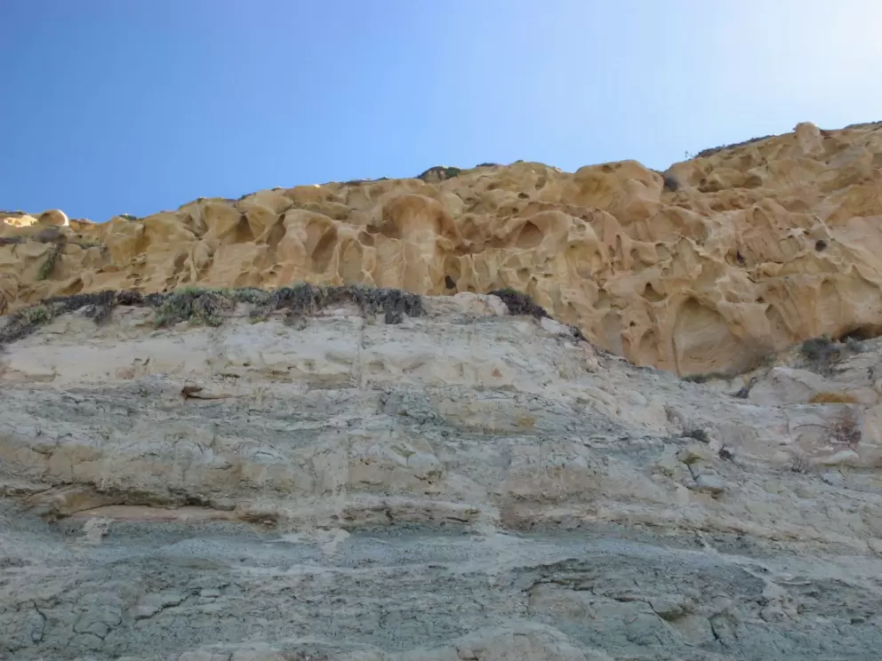 Looking up at the high cliffs.