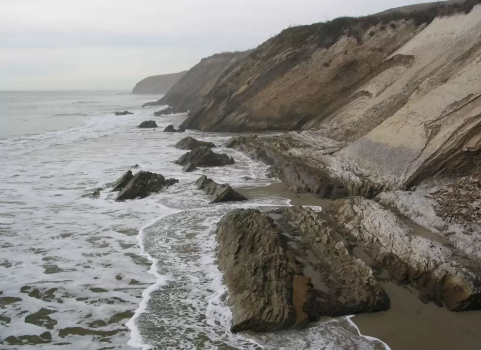 The amazing rock formations and cave, on the west side of the pier.