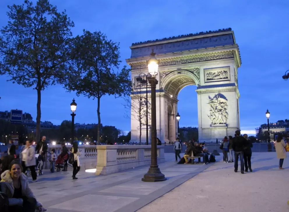 The magical look of the Arc de Triomphe from the Champs-Elysee at night.