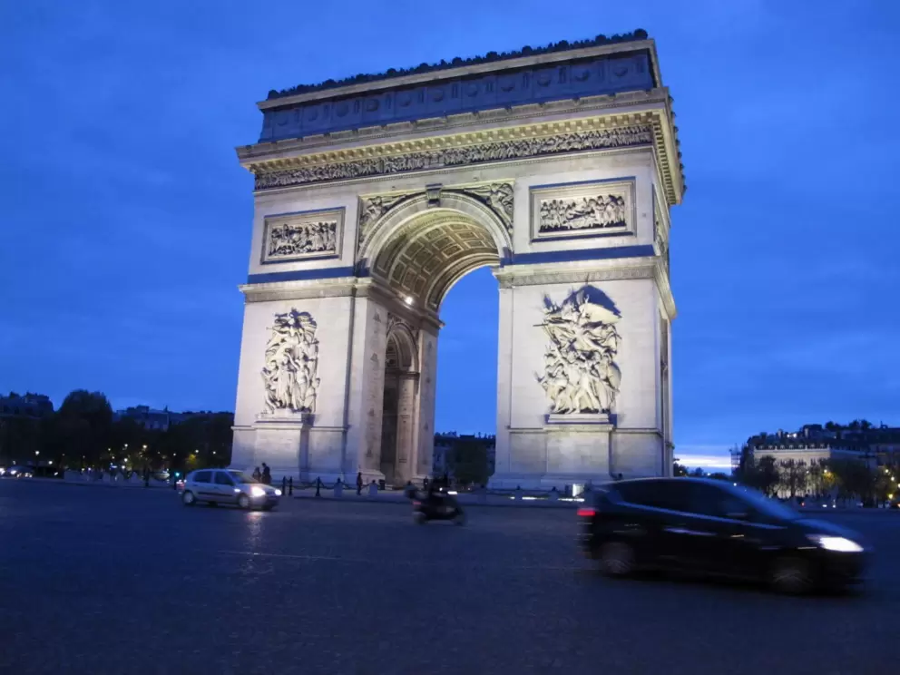 Car whizzing around the Charles de Gaulle roundabout.