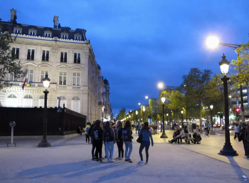 Hanging out on the Champs-Elysee. The buildings in Paris are so romantic!