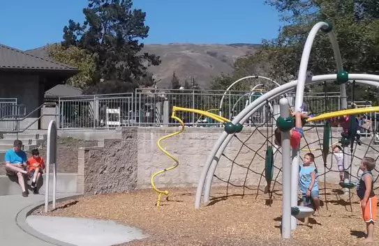 Kids have a blast on the space-age playground.