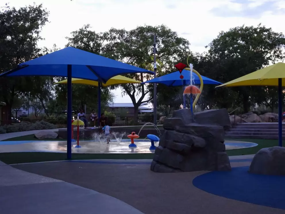 Umbrellas at the splash pad.