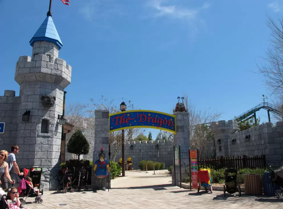 The Dragon rollercoaster, set in a castle with beautiful imagination elements.