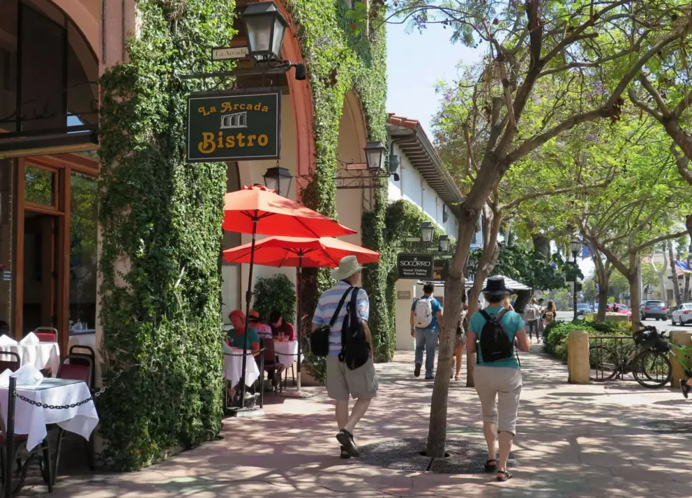 Shady sidewalk outside La Arcada Bistro.