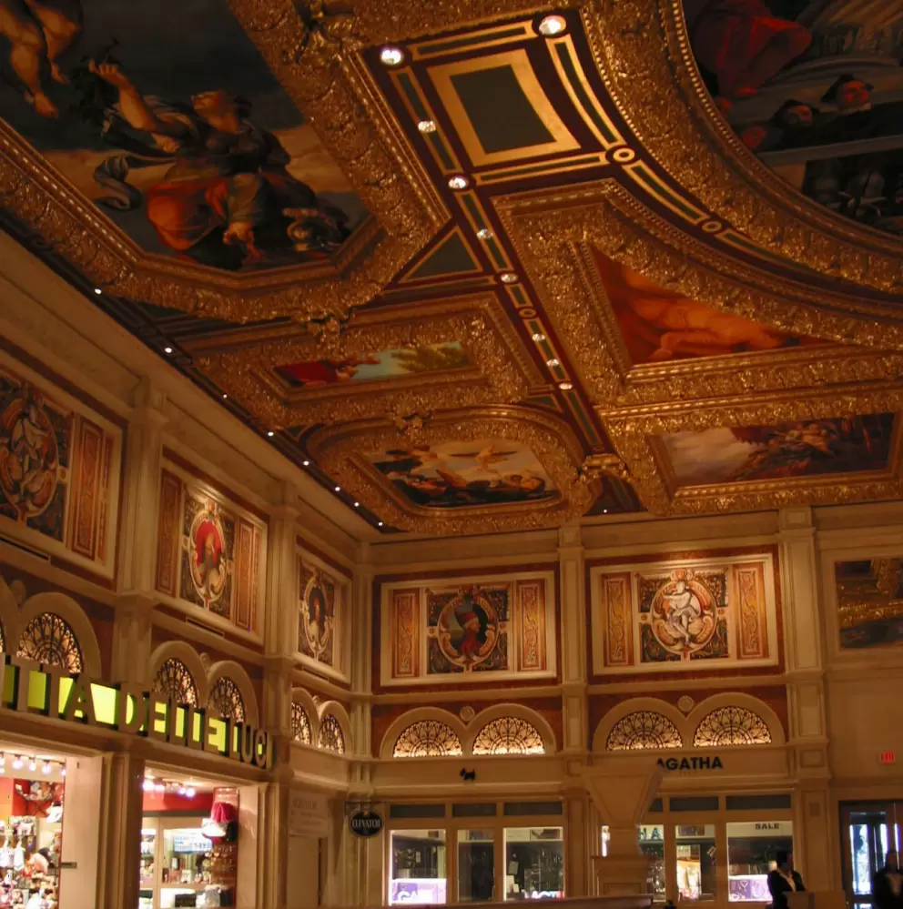 Painted walls and ceiling, with plenty of gold trim.