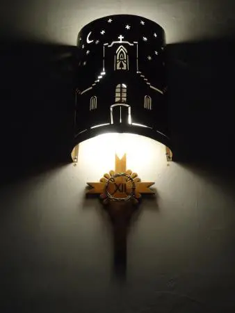 Decorations over a light inside the church.