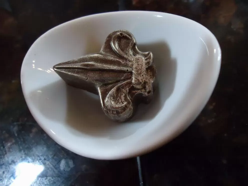 A fleur de lis chocolate at Strands Cafe.