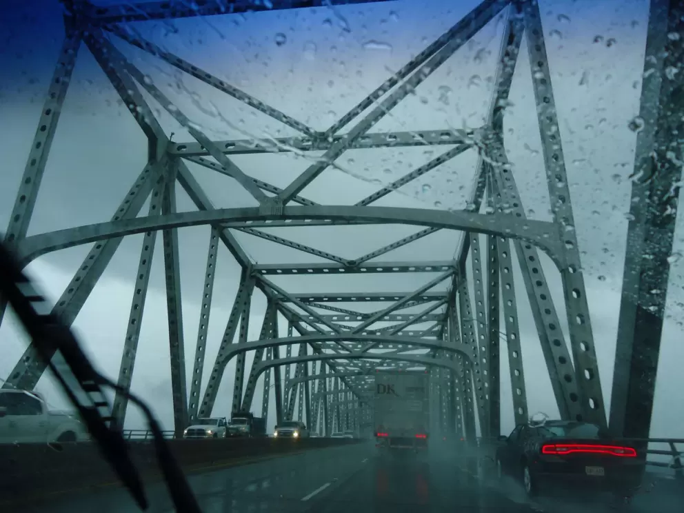 Driving across the Mississippi River in the rain.