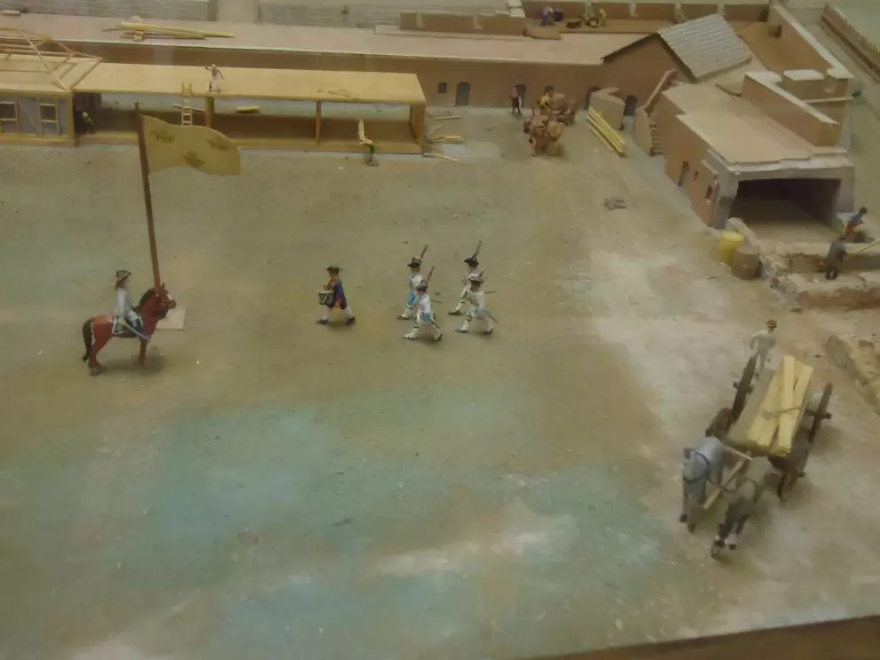 Little horse and flag, in the model of the fort.