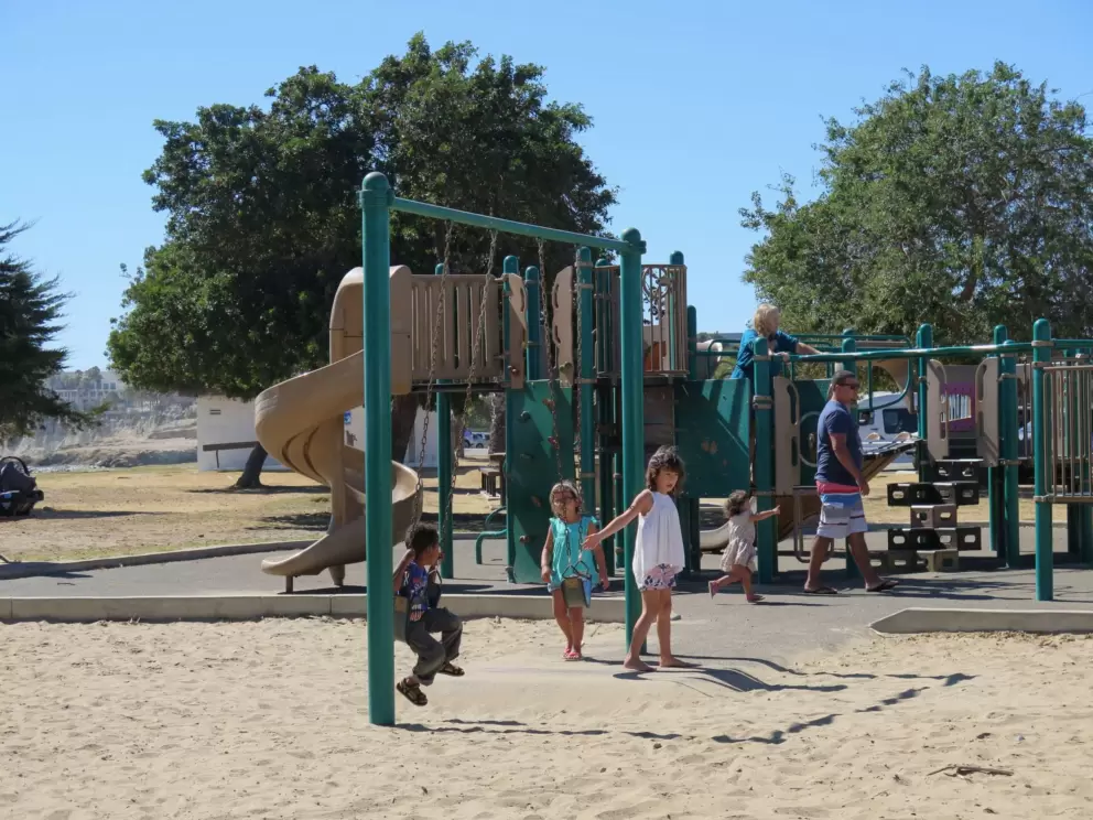 Kids playing on the playground.