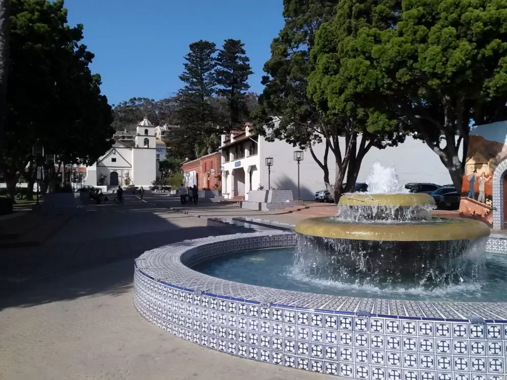 Lovely blue-tiled fountain, with the mission in the background.