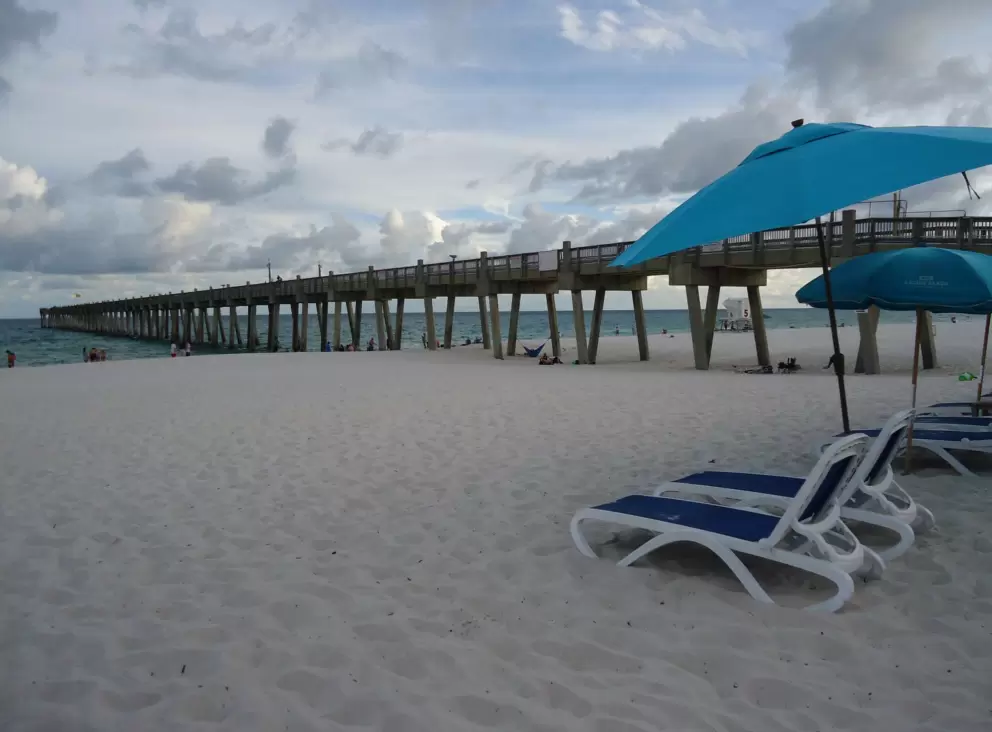 The pier and endless amounts of fine white sand!