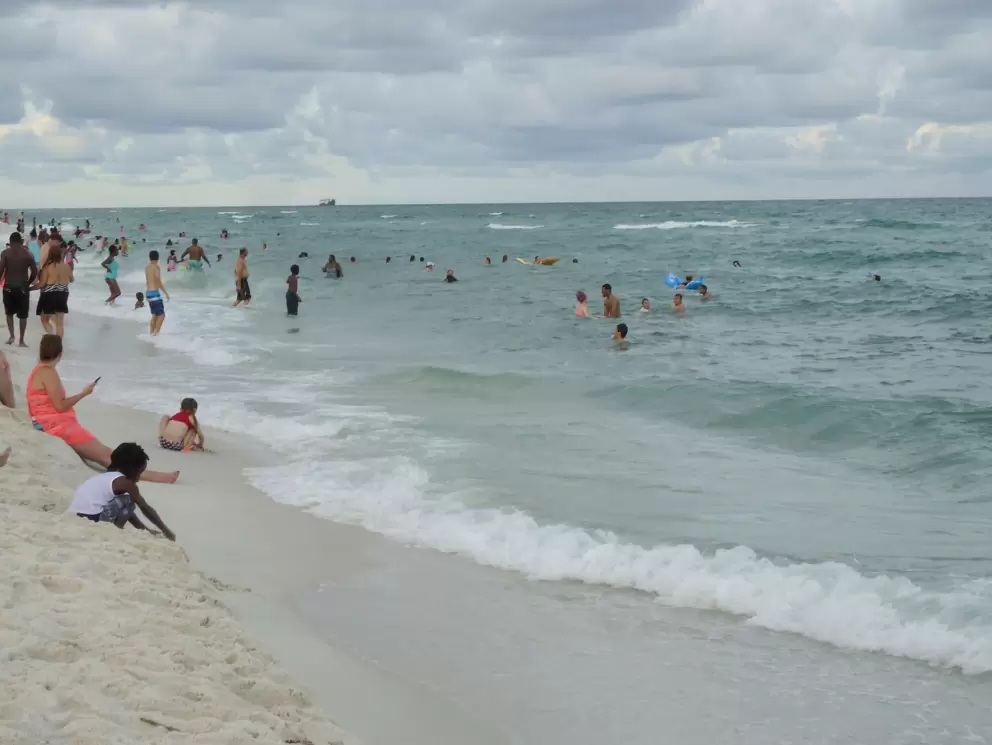 Lots of people swimming on a summer evening!