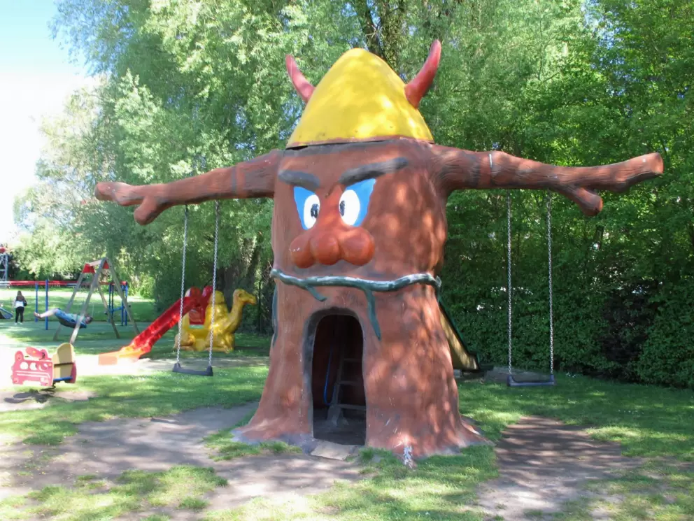 Mr. Tree swings.