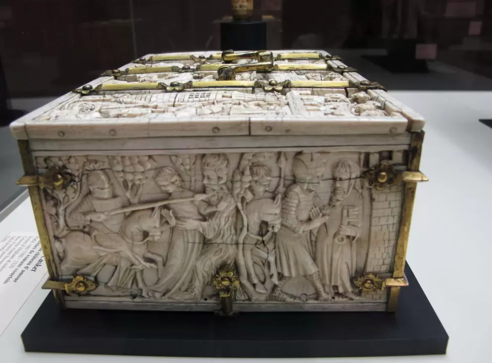 Ivory box with gold trim.