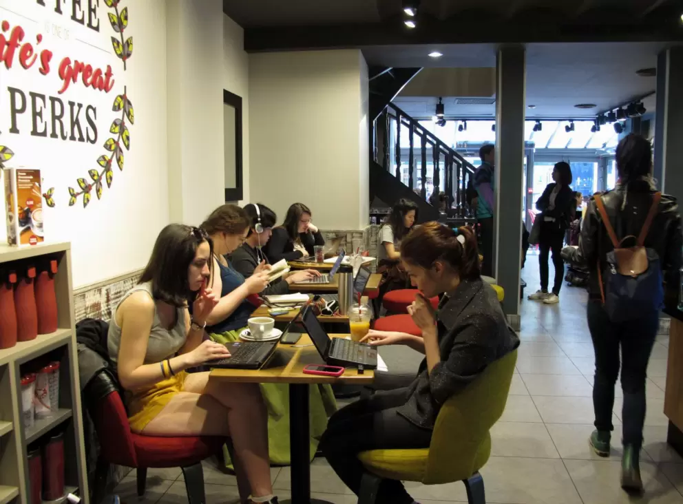 Students study inside Costa Coffee.