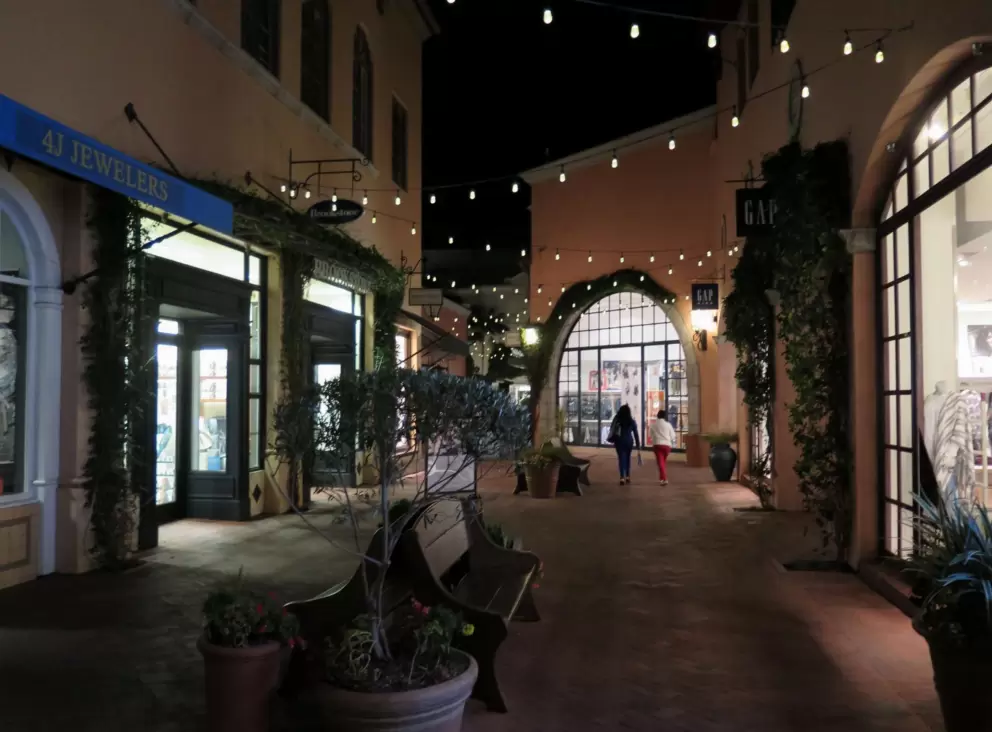 String lights by the shops.