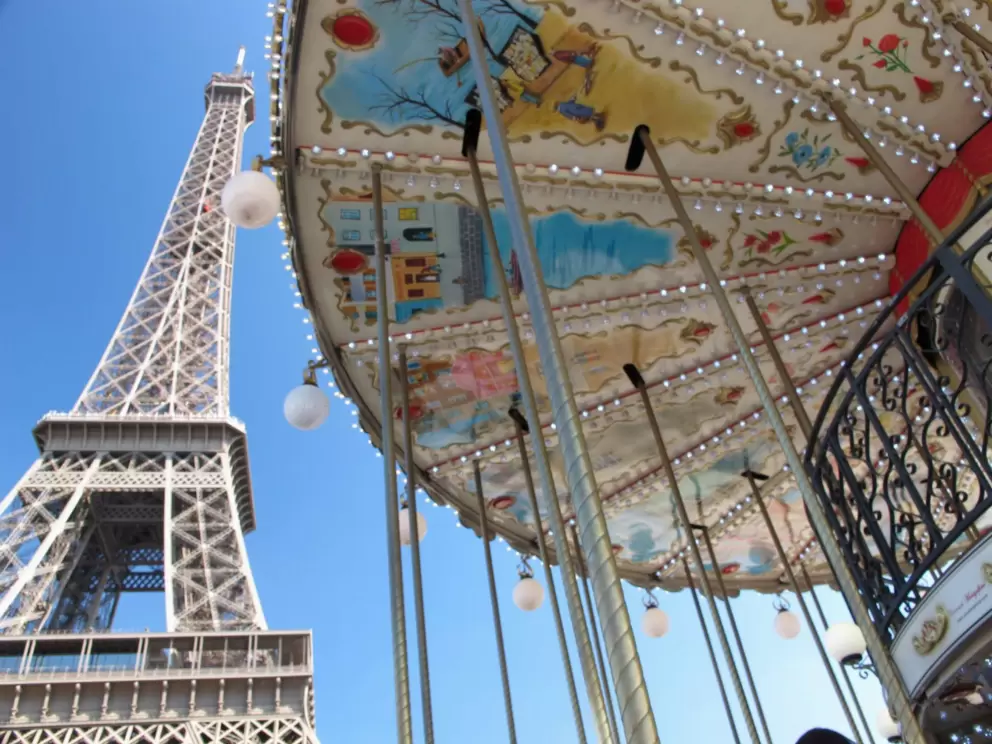 The two-storey carousel below the Eiffel Tower.
