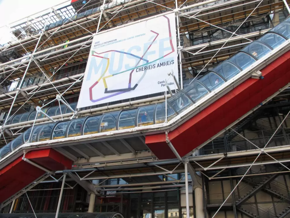 Red is the color of anything that moves people around the Centre Pompidou.