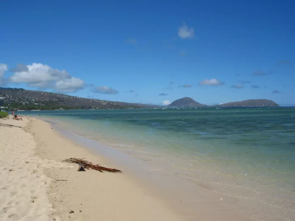 Views of clear waters and Koko Head, from Kahala beach.