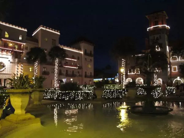 The Lightner Museum and Casa Monica lights reflecting in the fountain pool at Christmastime.