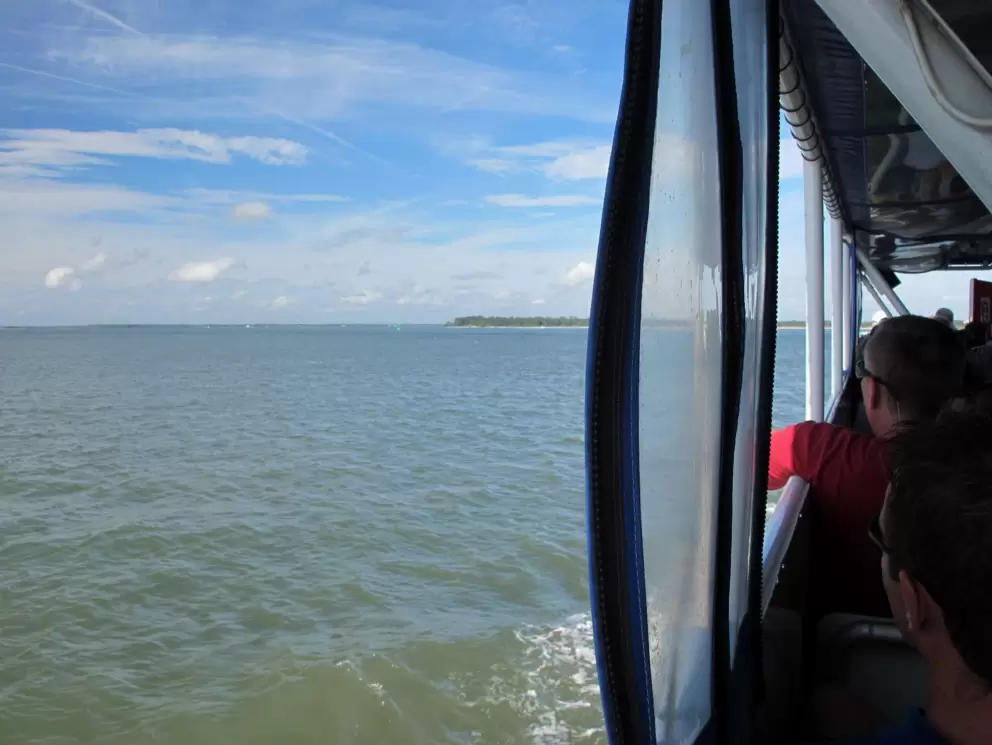 Enjoying the cool breeze off the water.