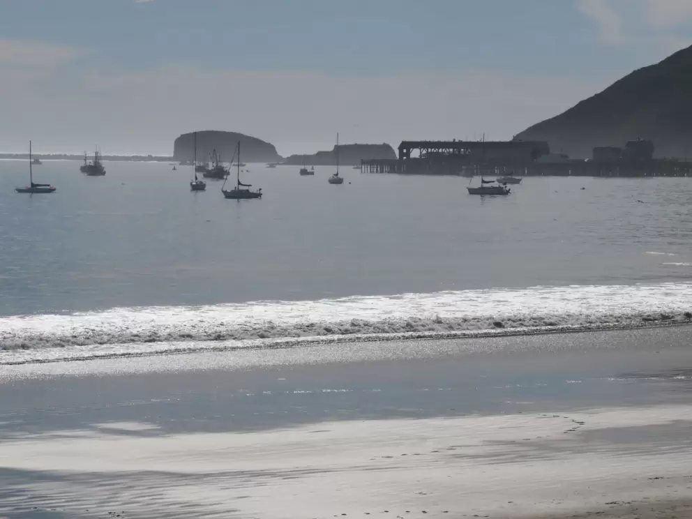 The boats in the harbor.