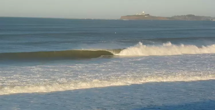 Big tube at Poplar Beach, with Pillar Point (the location of Mavericks) in the background.