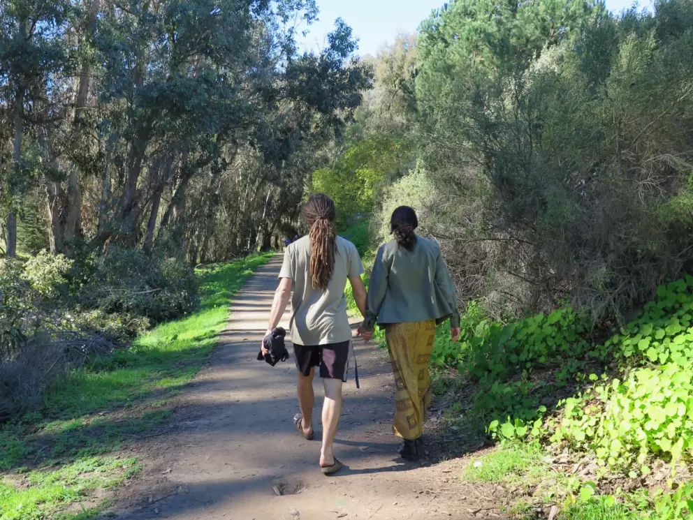 A cute young couple go for a Sunday walk.