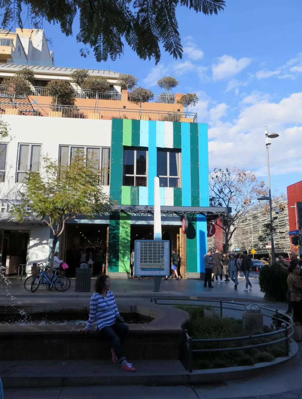 Multi-colored bluish stripes on a building.