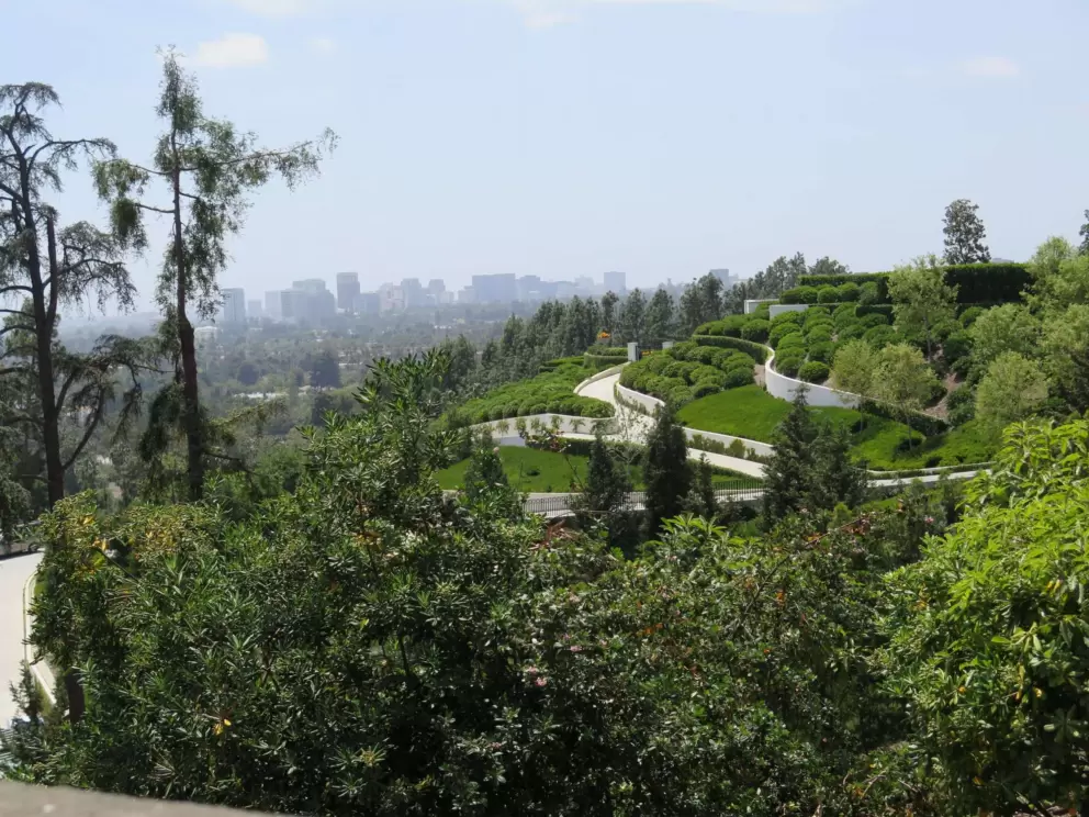 A terraced hill in the distance.