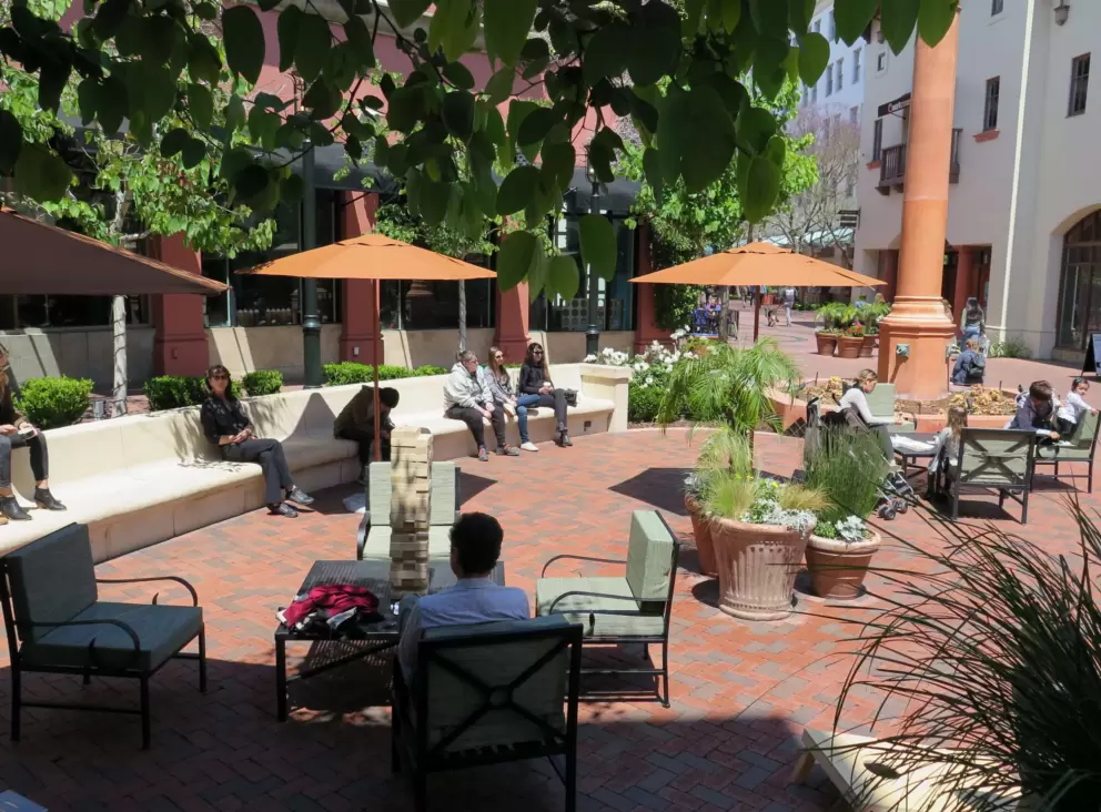 Sitting in the shade at the public space.