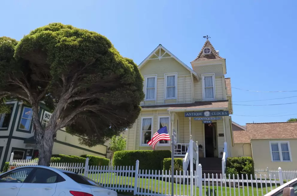 Antique clocks in a cute, cute house.