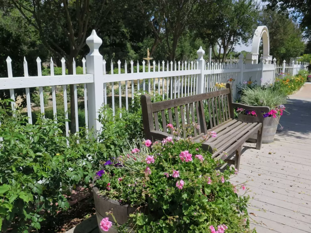 White fence surrounding Calabasas Creek Park.