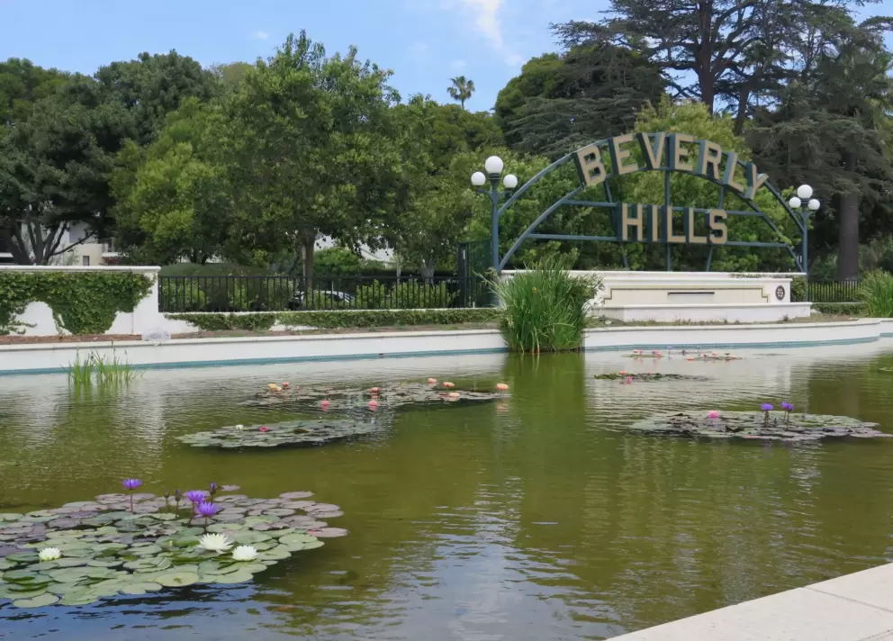 Water lilies and Beverly Hills sign in Beverly Gardens Park.