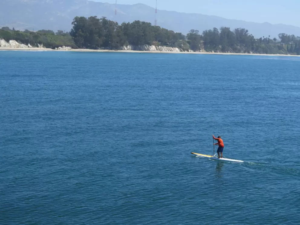 SUP far out in the water.