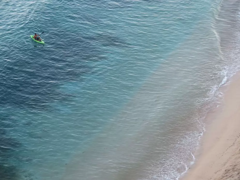 Kayaker enjoying early morning paddle.