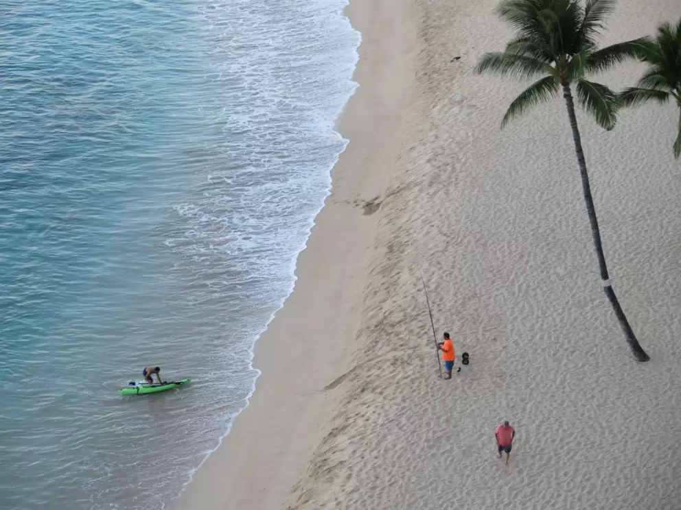 Fisherman on the beach in the morning.